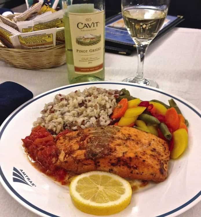 Dinner in the diner. Baked salmon, wild rice and mixed vegs. Salad and rolls included, too.