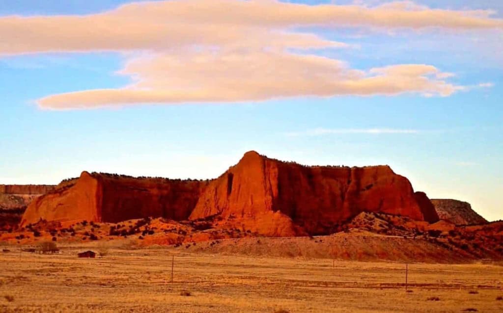 Passing through Red Rock mountains in New Mexico. Amtrak Chicago to Los Angeles.