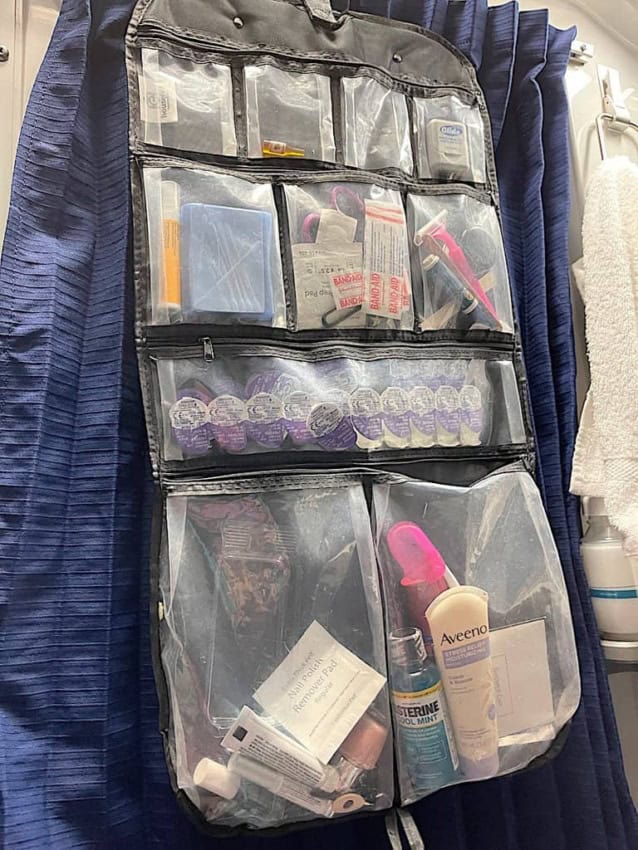 My hanging toiletry bag fits perfectly on the train hooks.