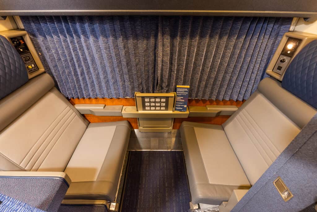 Amtrak Superliner Roomette with daytime seating arrangement.