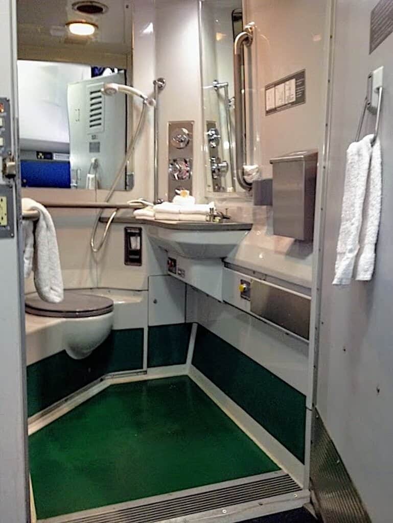 Amtrak wheelchair accessible bathroom in a bedroom.